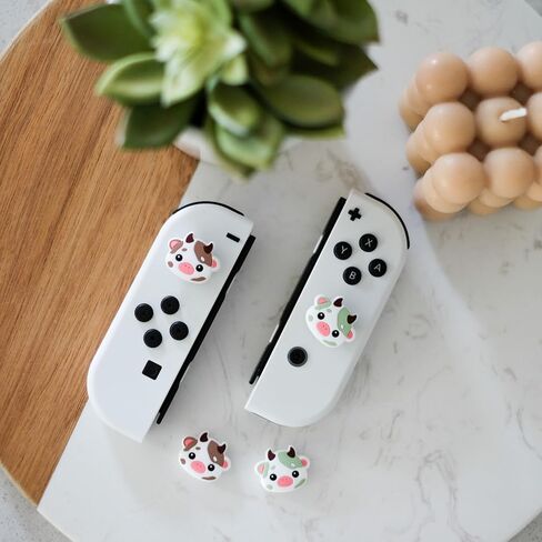 قبعات قبضة الإبهام من Cow Switch Joycon، غطاء عصا تحكم سيليكون ناعم لطيف متوافق مع Nintendo Switch/OLED/Switch Lite، أغطية أزرار مقابض عصا تناظرية للتبديل، مجموعة 4 قطع (وردي وأسود) in Saudi Arabia