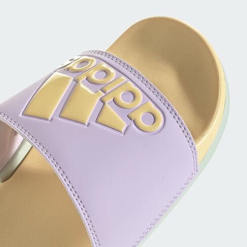 adidas Women's Adilette Comfort Slide Sandal, Ice Lavender/Orange Tint/Linen Green, 7 in Saudi Arabia