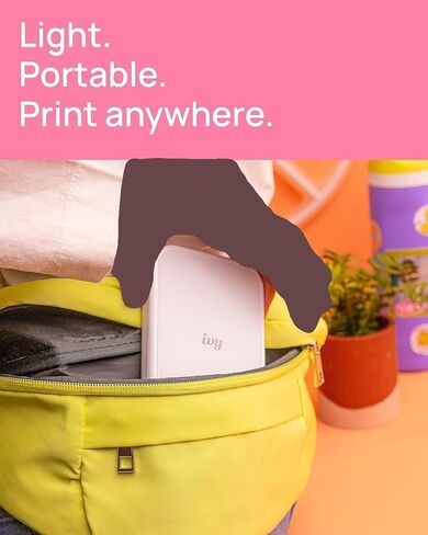 طابعة صور Canon Ivy 2 Mini (أبيض نقي) - بلوتوث، طباعة من أجهزة iOS وAndroid، تتضمن 110 مطبوعة Zink Sticky-Back، وشريط إضاءة LED، وحقيبة واقية، وكابل USB in Kuwait