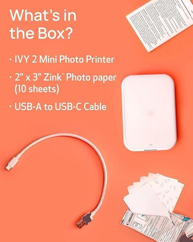 طابعة صور Canon Ivy 2 Mini (أبيض نقي) - بلوتوث، طباعة من أجهزة iOS وAndroid، تتضمن 110 مطبوعة Zink Sticky-Back، وشريط إضاءة LED، وحقيبة واقية، وكابل USB in Kuwait