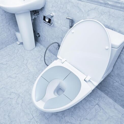 مقعد نونية للسفر قابل للطي للأطفال الصغار الأولاد والبنات، مقعد مرحاض محمول قابل للطي مع حقيبة تخزين، أكواب شفط غير قابلة للانزلاق، تناسب المراحيض الدائرية والبيضاوية باللون الأزرق in Kuwait