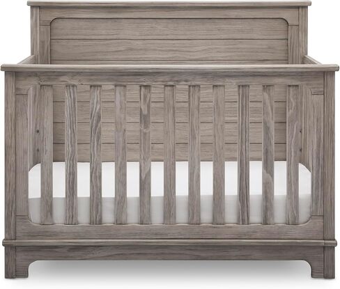 Delta Children Simmons Kids Slumbertime Monterey 4-in-1 Convertible Crib, Rustic White in Saudi Arabia