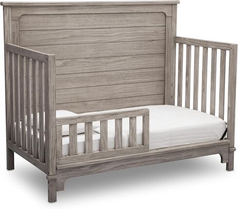Delta Children Simmons Kids Slumbertime Monterey 4-in-1 Convertible Crib, Rustic White in Saudi Arabia