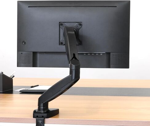 Amazon Basics Gas Spring Single Computer Monitor Arm Mount, Adjustable, Holds up to 27" Monitors, Black in Saudi Arabia