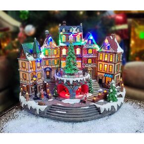 Christmas Village Centerpiece Decor, Tiered Village Town Center, with Rotating Train and Village Buildings, featuring LED Lights, Christmas Music, and Animation - Power Adapter (included)