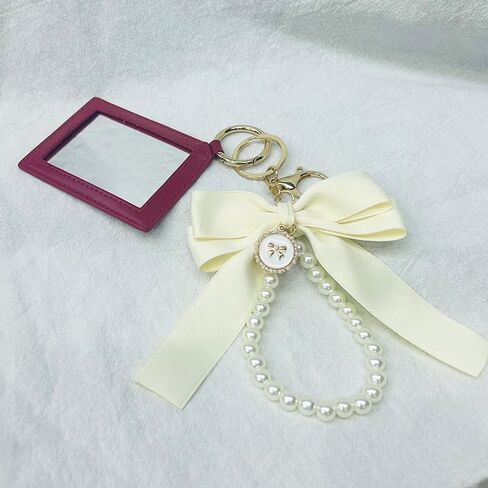 Pink Pearl Chain Bow Keychain for Women Girls White Pearl Keychain Wristlet for Purse Backpack Black Bow Charms in Saudi Arabia