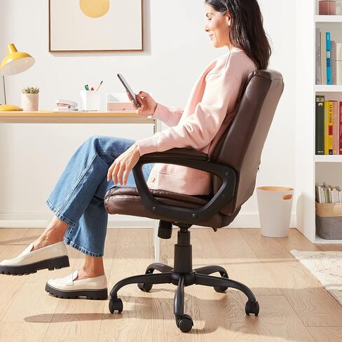 Amazon Basics Classic Puresoft PU Padded Mid-Back Office Computer Desk Chair with Armrest, 26"D x 23.75"W x 42"H, Black in Saudi Arabia