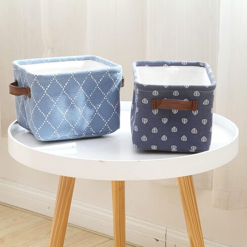 سلة تخزين صغيرة الحجم من Hinwo بحجم 4 لتر، سلة تخزين مربعة قابلة للطي من قماش الدنيم مع مقابض من جلد البولي يوريثان للأرفف والمكاتب، مجموعة من 4 قطع، 7.9 × 6.3 × 5.5 بوصة، أزرق داكن in Kuwait