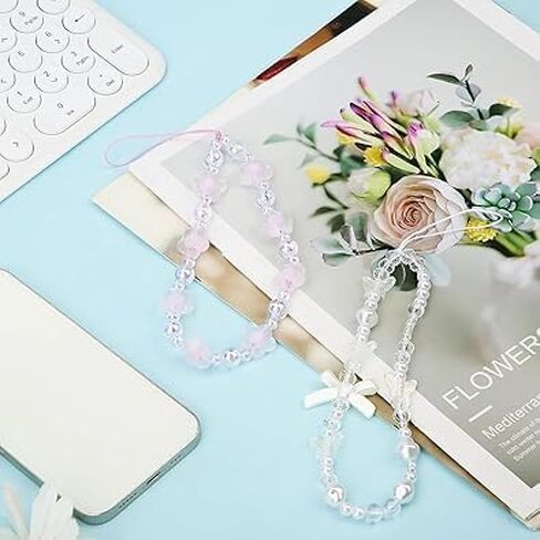 2Pcs White and Purple Bow Beaded Phone Bracelet Strap, Crystal Butterfly Flower Pearl Phone Beaded Wrist Strap Phone Bracelet Lanyard For Women Phone Keychain Charm Fashion design Décor in Saudi Arabia