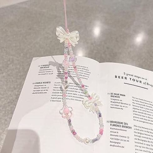 2Pcs White and Purple Bow Beaded Phone Bracelet Strap, Crystal Butterfly Flower Pearl Phone Beaded Wrist Strap Phone Bracelet Lanyard For Women Phone Keychain Charm Fashion design Décor in Saudi Arabia