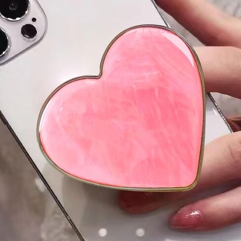 قبضة هاتف على شكل قلب وردي لطيف من Xerial - حامل هاتف قابل للطي بنمط صدف، حامل هاتف للفتيات والنساء، مقبض هاتف بمقبض محبب لهاتف iPhone وKindle، حامل بمقبض سريع للأصابع، مقبض بوب للهاتف in Kuwait