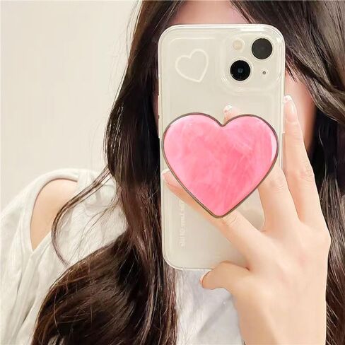 قبضة هاتف على شكل قلب وردي لطيف من Xerial - حامل هاتف قابل للطي بنمط صدف، حامل هاتف للفتيات والنساء، مقبض هاتف بمقبض محبب لهاتف iPhone وKindle، حامل بمقبض سريع للأصابع، مقبض بوب للهاتف in Kuwait