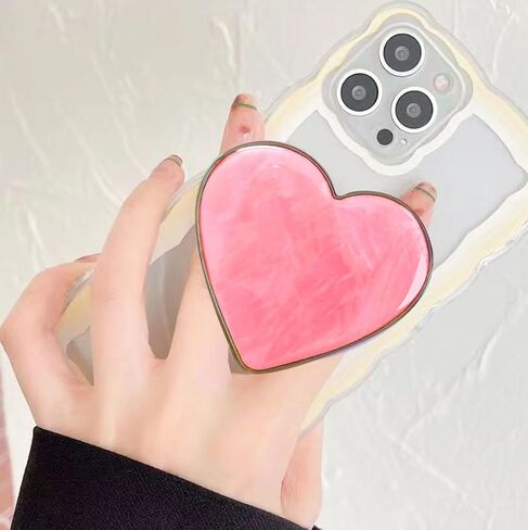 قبضة هاتف على شكل قلب وردي لطيف من Xerial - حامل هاتف قابل للطي بنمط صدف، حامل هاتف للفتيات والنساء، مقبض هاتف بمقبض محبب لهاتف iPhone وKindle، حامل بمقبض سريع للأصابع، مقبض بوب للهاتف in Kuwait