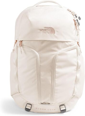 حقيبة ظهر للكمبيوتر المحمول Surge Luxe للنساء من THE NORTH FACE، لون جاردينيا أبيض/مرجاني محترق معدني، مقاس واحد in Saudi Arabia