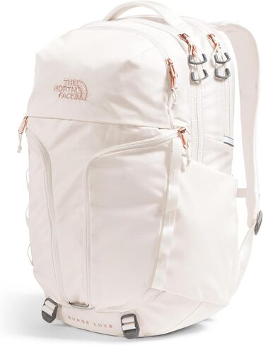 حقيبة ظهر للكمبيوتر المحمول Surge Luxe للنساء من THE NORTH FACE، لون جاردينيا أبيض/مرجاني محترق معدني، مقاس واحد in Saudi Arabia
