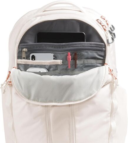حقيبة ظهر للكمبيوتر المحمول Surge Luxe للنساء من THE NORTH FACE، لون جاردينيا أبيض/مرجاني محترق معدني، مقاس واحد in Saudi Arabia