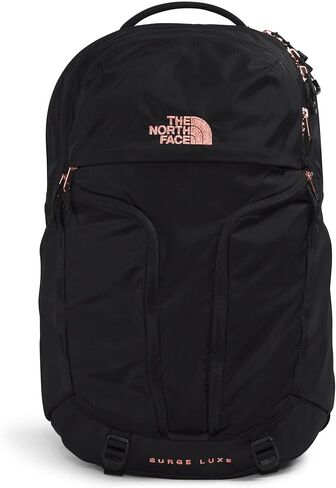 حقيبة ظهر للكمبيوتر المحمول Surge Luxe للنساء من THE NORTH FACE، لون جاردينيا أبيض/مرجاني محترق معدني، مقاس واحد in Saudi Arabia