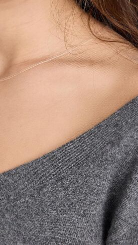 بلوفر نسائي من Alexander Wang برقبة على شكل حرف V مع تول وهمي in Kuwait