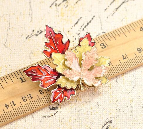 Gyn&Joy Maple leaf brooch pin in Saudi Arabia