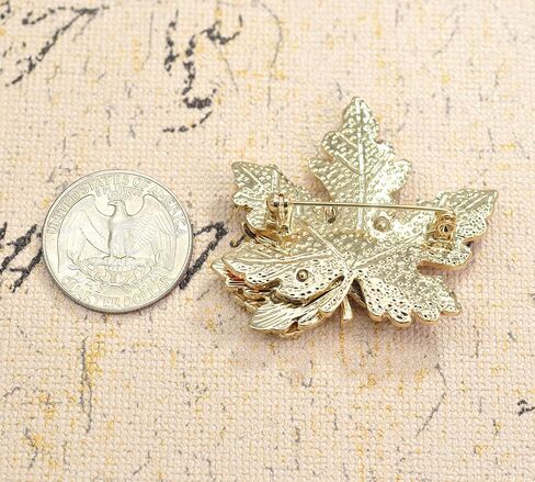 Gyn&Joy Maple leaf brooch pin in Saudi Arabia