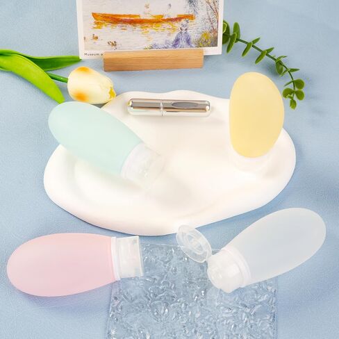 4 Pcs Travel Size Bottles for Toiletries, 3.4 oz Silicone Travel Containers for Toiletries With a Perfume Refillable Bottle, Larger Tsa Approved Toiletry Bottles in Saudi Arabia