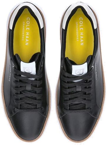 Cole Haan Women's Grandpro Topspin Sneaker, Black/Optc Wht/Cyber Yellow, 9.5 in Saudi Arabia