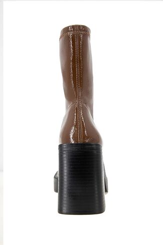 Kenneth Cole New York Women's Amber Ankle Boot Loafer in Saudi Arabia