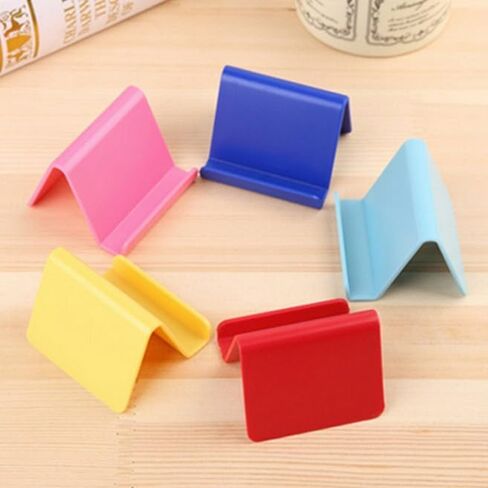 ملحقات الهاتف المحمول Pink Universal Candy حامل سطح المكتب الصغير المحمول لهاتف iPhone Xiaomi حامل الطاولة الخلوي، والإكسسوارات، وحوامل الهاتف الخلوي in Saudi Arabia