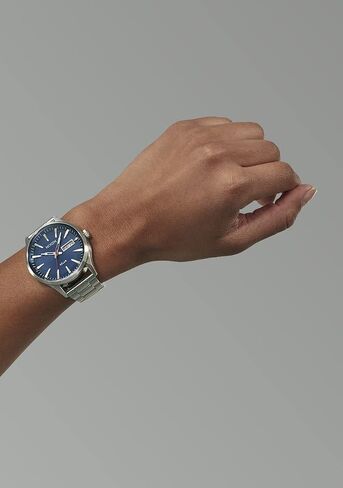 NIXON Sentry Solar A1346-100m Water Resistant Stainless Steel Solar Powered Analog Watch (40 mm Watch Face, 20-18 mm Custom Tapered Stainless Steel Band) in Saudi Arabia