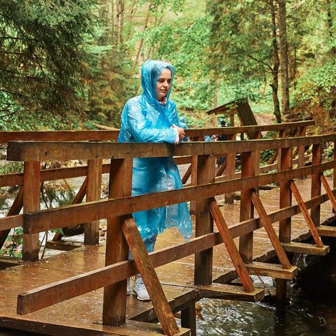 Rain Ponchos by Cloud 10. Include 4 Packs of Blue Disposable Rain Ponchos. Longer Sleeves Poncho Raincoat and Larger Hooded Poncho Rain Coat. Thick Rain Ponchos for Adults, Kids, Men, and Women. in Kuwait