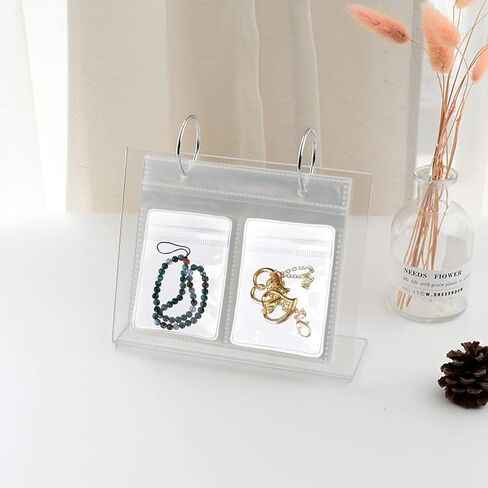 كتاب تخزين مجوهرات شفاف، منظم اقراط المجوهرات، منظم مجوهرات شفاف، رف سطح المكتب، عرض تخزين المجوهرات بسحاب للقلائد والاقراط والخواتم والاساور مع جيوب (68 شبكة) in Kuwait