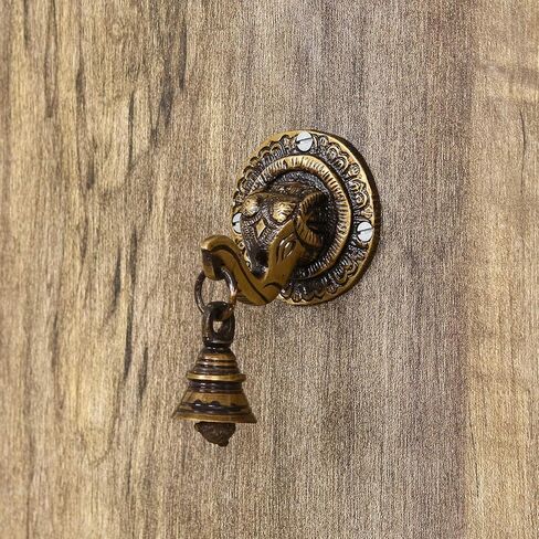 eCraftIndia نحاس لورد غانيش وجه معلق على الحائط مع جرس in Kuwait