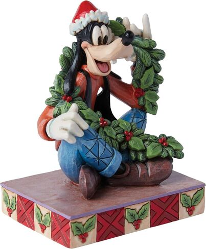 مجموعة Enesco Disney Traditions من Jim Shore Goofy مع تمثال شخصية لعيد الميلاد على شكل إكليل عيد الميلاد - تمثال من الراتنج مرسومة يدويًا لعيد الميلاد من Disney لديكور المنزل، 4.62 بوصة in Saudi Arabia