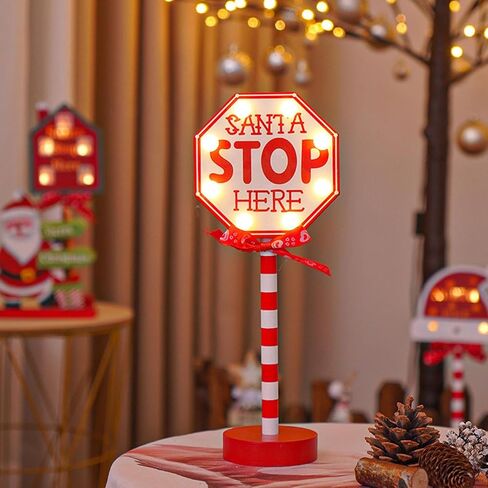 Christmas Decorations Santa Stop Here Pole Sign with LED Light Xmas Tabletop Stand Decor for Indoor Home Office Holiday Party Decorative Christmas Street Sign Holiday Housewarming Gift (octagon) in Saudi Arabia