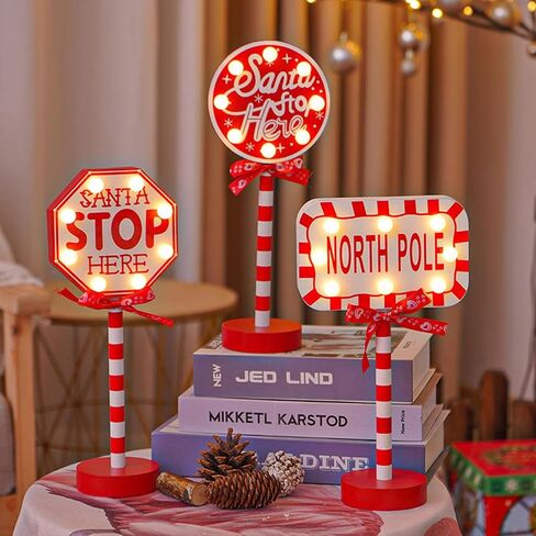 Christmas Decorations Santa Stop Here Pole Sign with LED Light Xmas Tabletop Stand Decor for Indoor Home Office Holiday Party Decorative Christmas Street Sign Holiday Housewarming Gift (octagon) in Saudi Arabia
