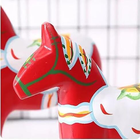 حصان دالا هزاز خشبي ذو طابع سويدي باللون البرتقالي والأحمر مع ملصق فني ولمسات مرسومة يدويًا، وزخارف زينة حصان دالارنا in Saudi Arabia