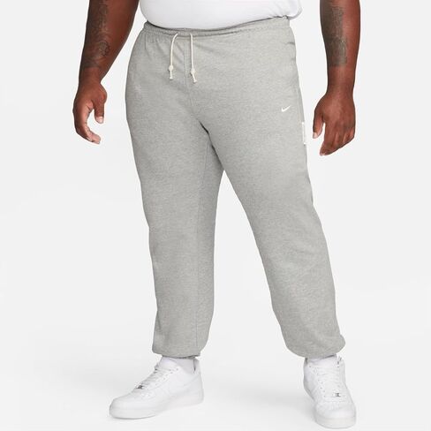 بنطال كرة السلة Dri-FIT للرجال من نايكي Standard Issue (CK6365-063، رمادي داكن منقط/عاجي شاحب) in Saudi Arabia