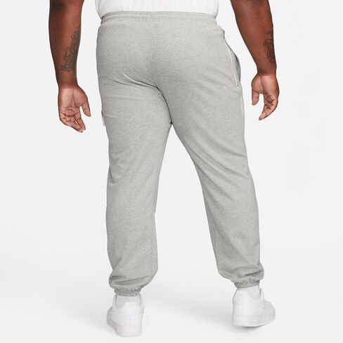 بنطال كرة السلة Dri-FIT للرجال من نايكي Standard Issue (CK6365-063، رمادي داكن منقط/عاجي شاحب) in Saudi Arabia
