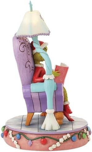 كرسي القراءة Enesco Dr. Seuss Grinch من Jim Shore Grinch مع تمثال مضاء بمصباح، راتنج حجري مصنوع يدويًا من الراتنج المضيء لعيد الميلاد تمثال منحوت لديكور المنزل، 8 بوصة، متعدد الألوان in Saudi Arabia