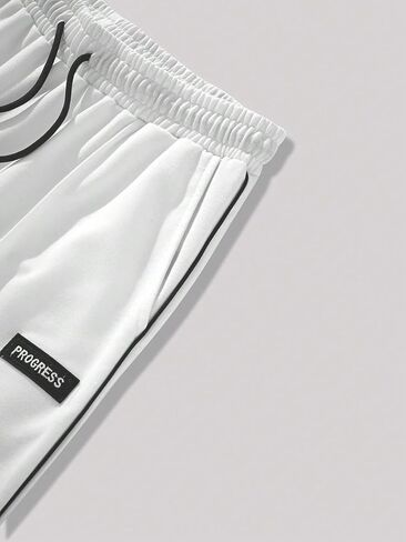 Verdusa Men's Wide Leg Letter Patched Elastic Drawstring Waist Sweatpants with Slant Pocket in Saudi Arabia