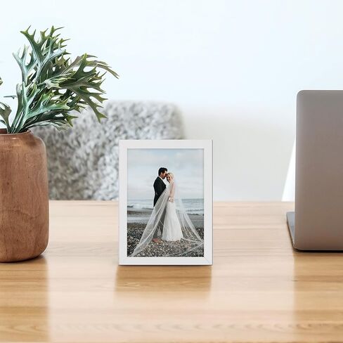 HappyHapi 5x7 Picture Frames, 7 Pack Photo Frames, Display Pictures 5x7 without Mat or 4x6 with Mat, Wall Hanging Photo Frame or Tabletop Display (White) in Saudi Arabia