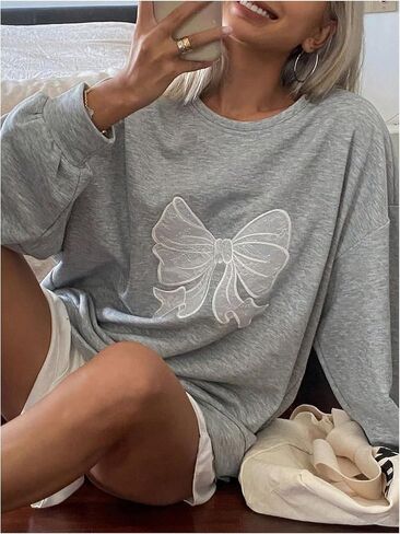 Women's Oversized Sweatshirts Bow Long Sleeve Crewneck Drop Shoulder Graphic Pullover Tops Trendy in Saudi Arabia