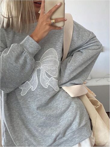 Women's Oversized Sweatshirts Bow Long Sleeve Crewneck Drop Shoulder Graphic Pullover Tops Trendy in Saudi Arabia