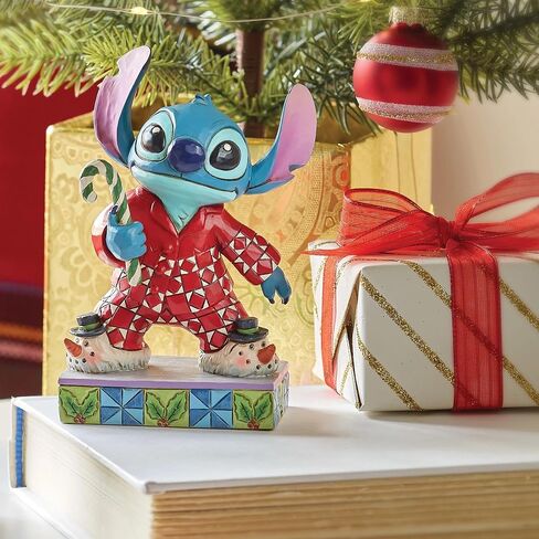مجموعة Enesco Disney Traditions من تصميم Jim Shore Lilo and Stitch بيجامة عيد الميلاد - تمثال من الراتنج الحجري مرسومة يدويًا بخياطة قابلة للجمع، تمثال ديزني لديكور المنزل، 4.62 بوصة in Saudi Arabia