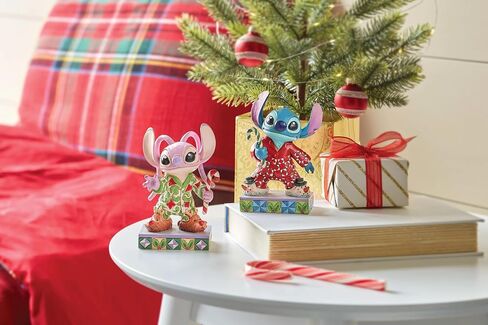 مجموعة Enesco Disney Traditions من تصميم Jim Shore Lilo and Stitch بيجامة عيد الميلاد - تمثال من الراتنج الحجري مرسومة يدويًا بخياطة قابلة للجمع، تمثال ديزني لديكور المنزل، 4.62 بوصة in Saudi Arabia