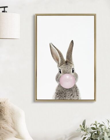 لوحة فنية جدارية من القماش مؤطرة من Kate and Laurel Sylvie Bubble Gum Bunny من تصميم Amy Peterson Art Studio، مقاس 18 × 24 طبيعية، فن حيوان غريب الأطوار لطيف للجدار in Saudi Arabia