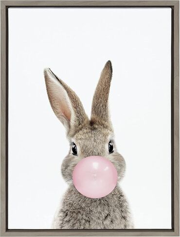 لوحة فنية جدارية من القماش مؤطرة من Kate and Laurel Sylvie Bubble Gum Bunny من تصميم Amy Peterson Art Studio، مقاس 18 × 24 طبيعية، فن حيوان غريب الأطوار لطيف للجدار in Saudi Arabia