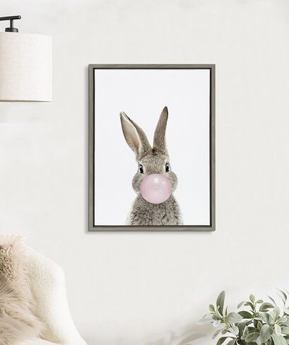 لوحة فنية جدارية من القماش مؤطرة من Kate and Laurel Sylvie Bubble Gum Bunny من تصميم Amy Peterson Art Studio، مقاس 18 × 24 طبيعية، فن حيوان غريب الأطوار لطيف للجدار in Saudi Arabia