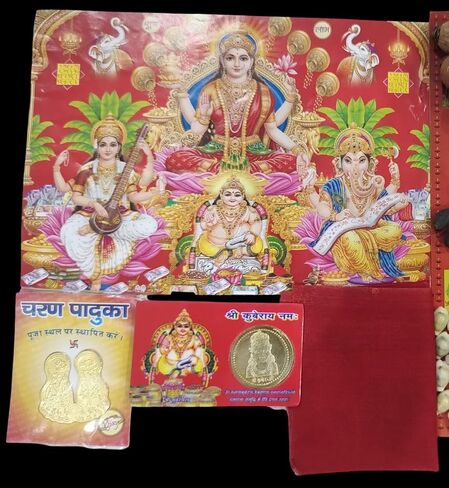 laxmi puja samagri Diwali Pooja kit Lakshi Ganesh sarswati Page laxmi Aarti Page shri kubray Yantra Lakshmi charan paduka gomati Chakra k gatta Yellow kaudi Pooja samgari in Saudi Arabia