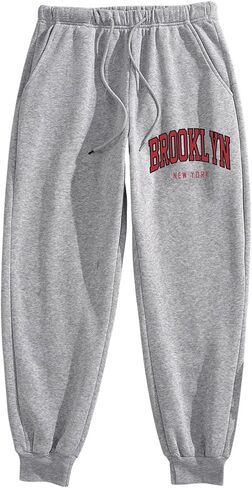 Men's Letter Graphic Sweatpants Drawstring Waist Tie Front Casual Jogger Pants with Pockets in Saudi Arabia